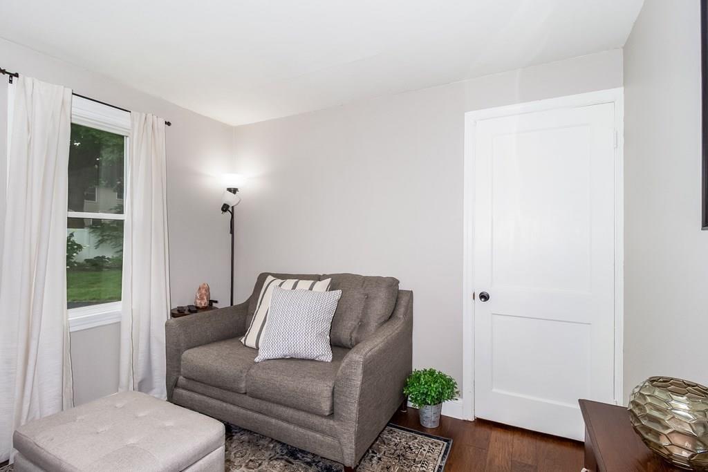 75 Garland Street Springfield, MA 01118 - Photo 23 of 32 a living room with furniture and a window