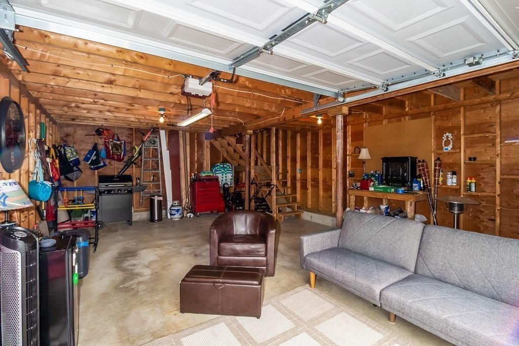 75 Garland Street Springfield, MA 01118 - Photo 27 of 32 a view of a garage with a couch