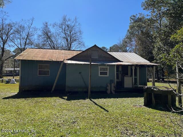 18455 Ware Avenue Jacksonville, FL 32234 - Photo 8 of 8 a front view of a house with a yard