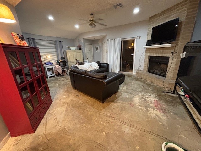 1908 Chelsea Court Rosenberg, TX 77471 - Photo 7 of 9 a living room with furniture a flat screen tv and a fireplace