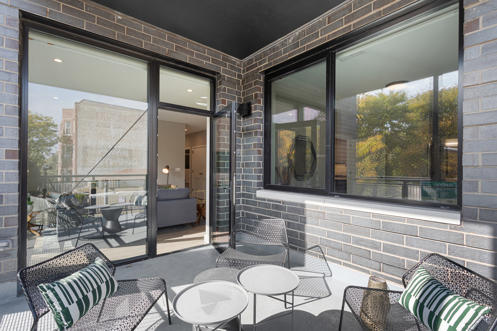 Undisclosed Address Chicago, IL 60618 - Photo 15 of 34 a living room with furniture and a floor to ceiling window