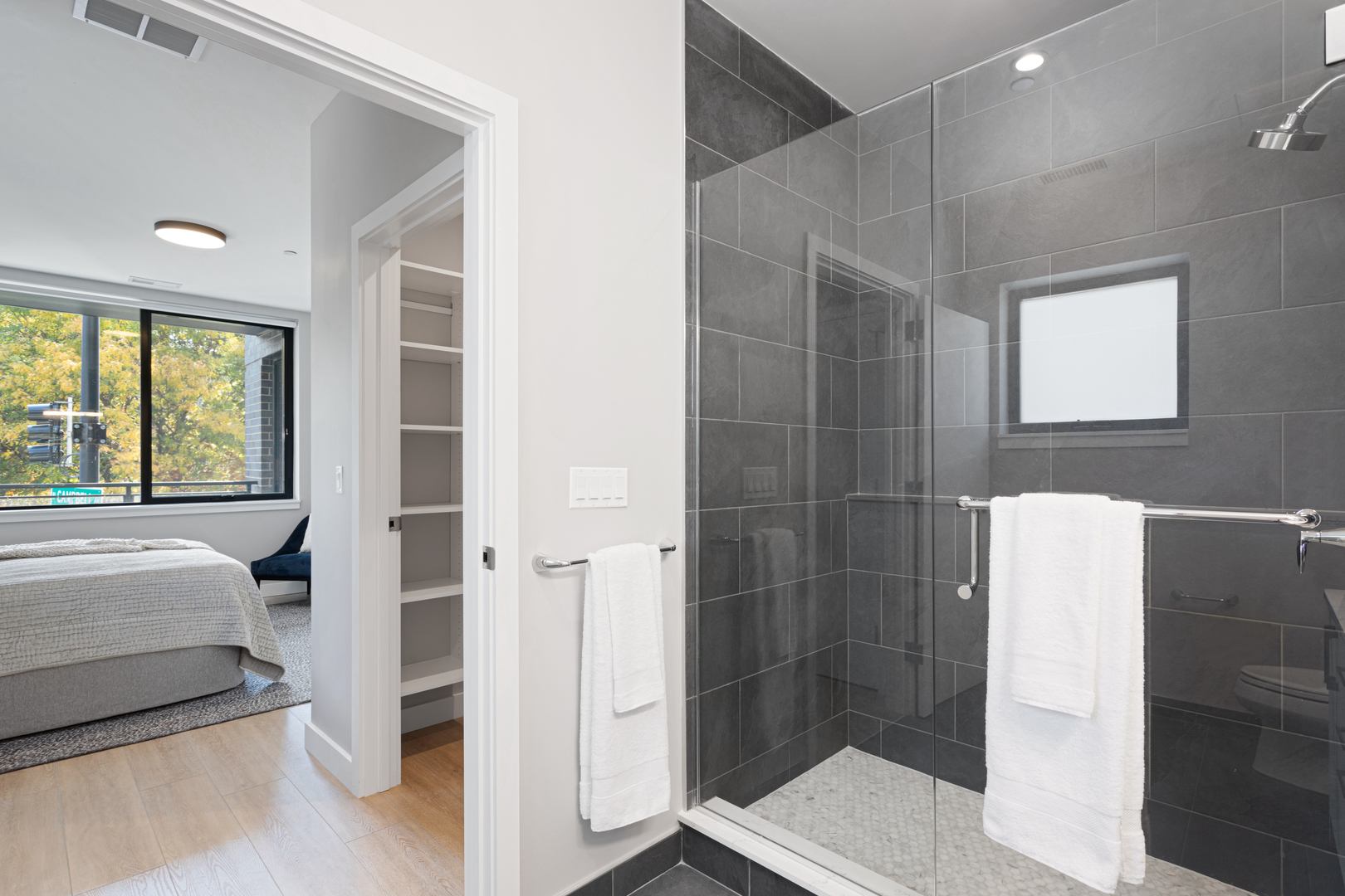 Undisclosed Address Chicago, IL 60618 - Photo 23 of 34 a bathroom with a bathtub and a shower