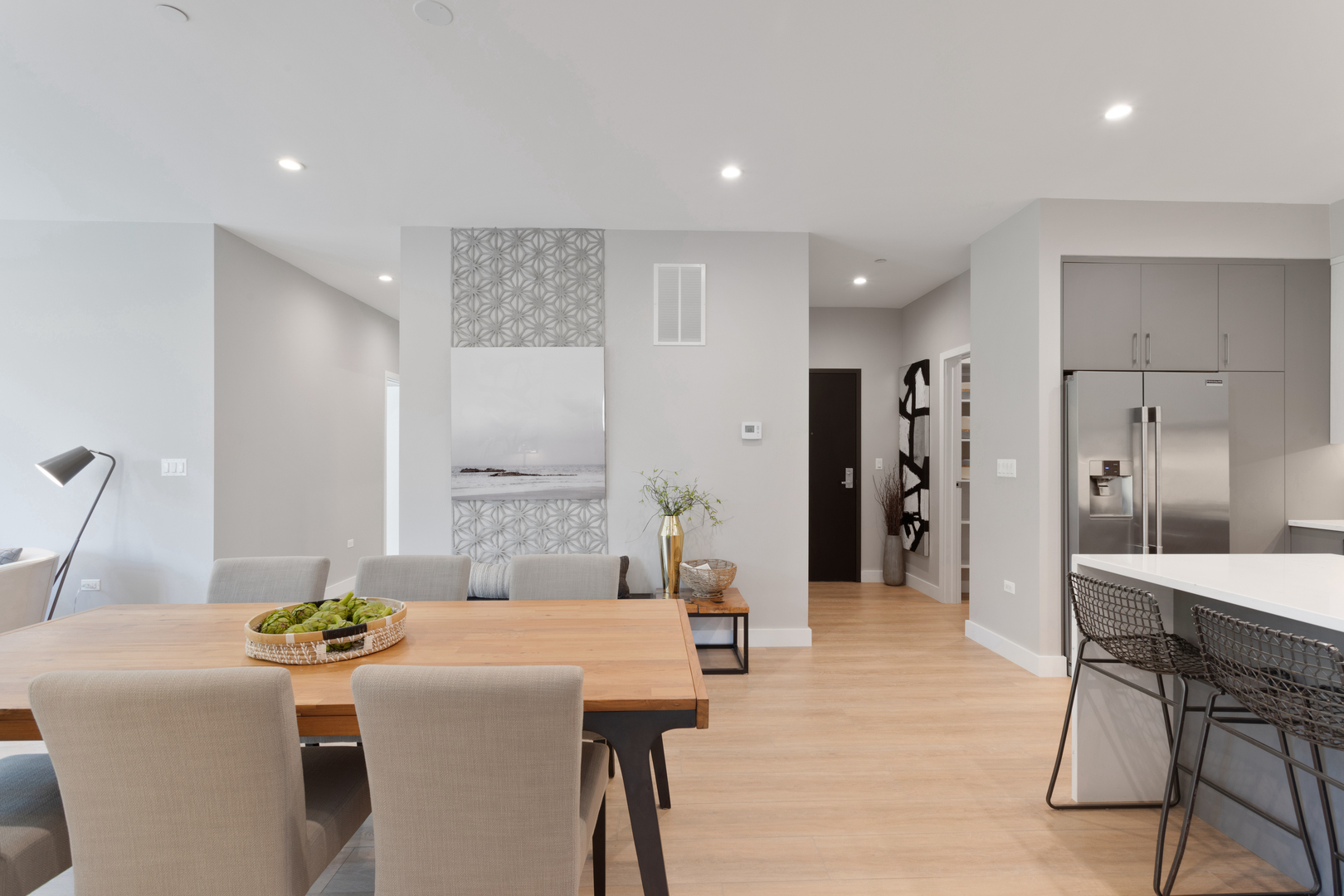 Undisclosed Address Chicago, IL 60618 - Photo 7 of 34 a living room with kitchen island furniture and a chandelier
