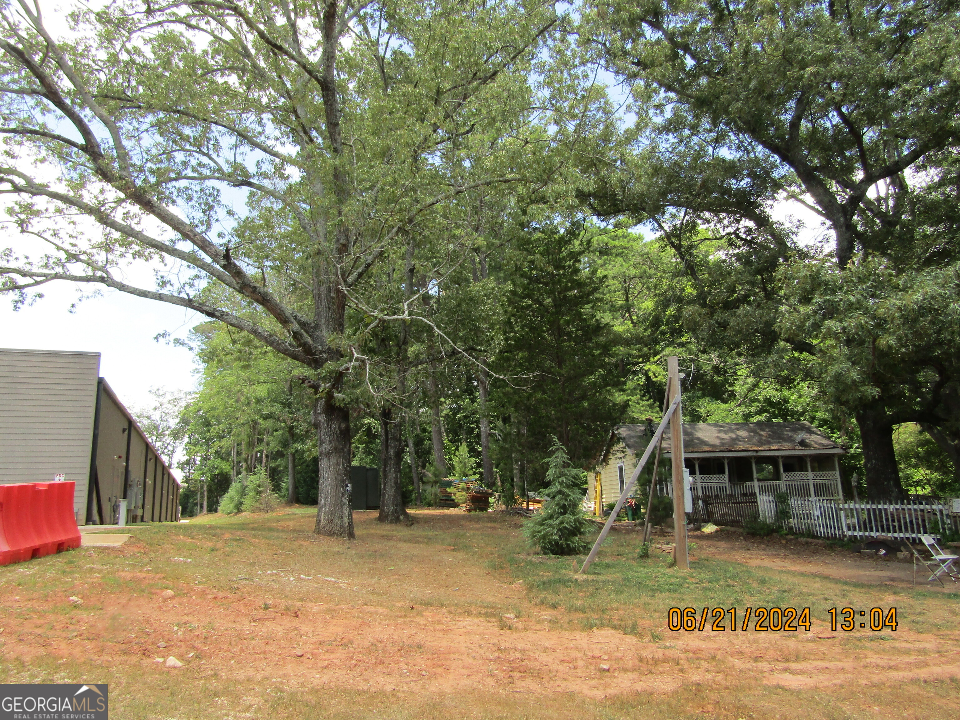2169 Panola Road Lithonia, GA 30058 - Photo 9 of 10 a house with trees in the background