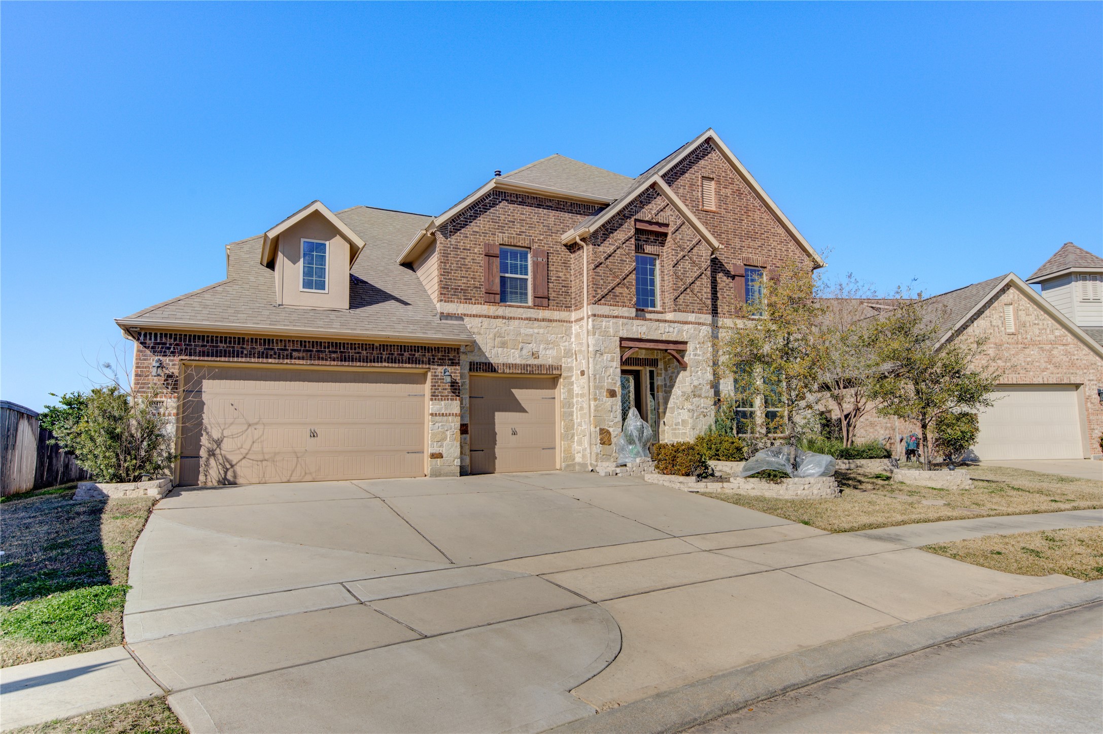 20411 Fawn Rest Place Spring, TX 77379 - Photo 1 of 50 a front view of a house with a yard