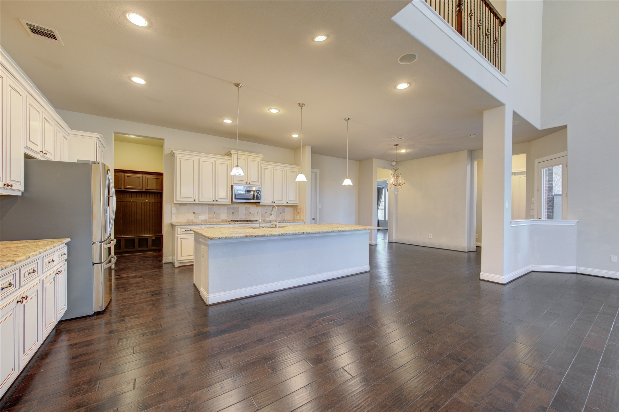 20411 Fawn Rest Place Spring, TX 77379 - Photo 11 of 50 a large kitchen with stainless steel appliances granite countertop a large counter top a sink and a refrigerator