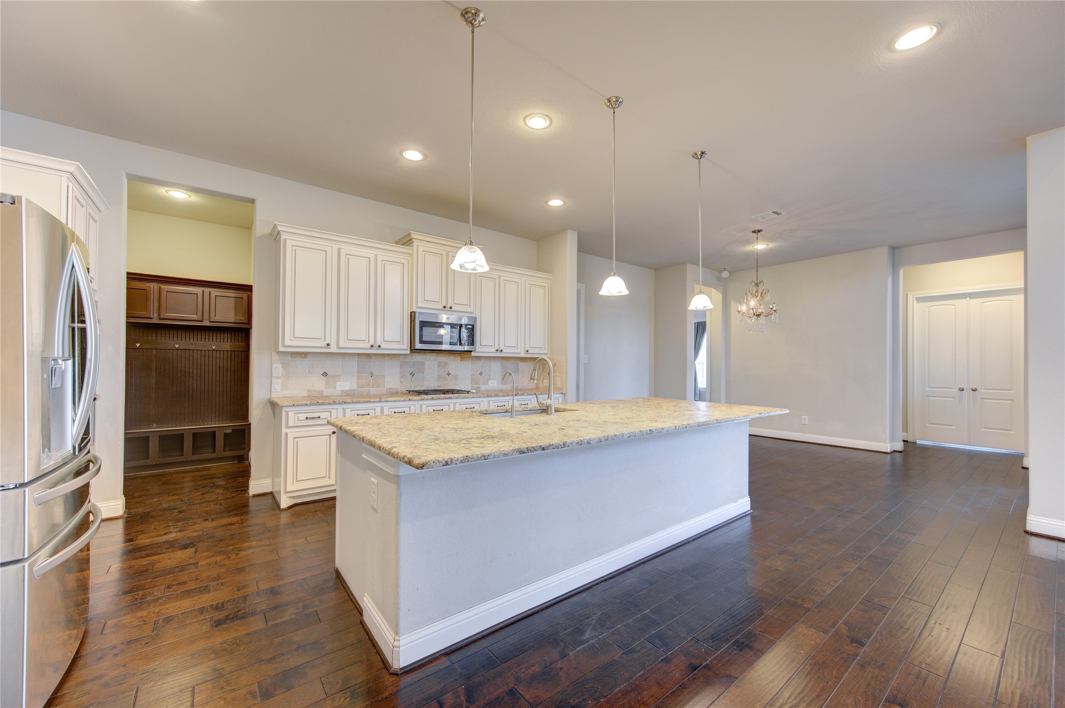 20411 Fawn Rest Place Spring, TX 77379 - Photo 12 of 50 a large kitchen with stainless steel appliances granite countertop a large counter top a sink and a refrigerator