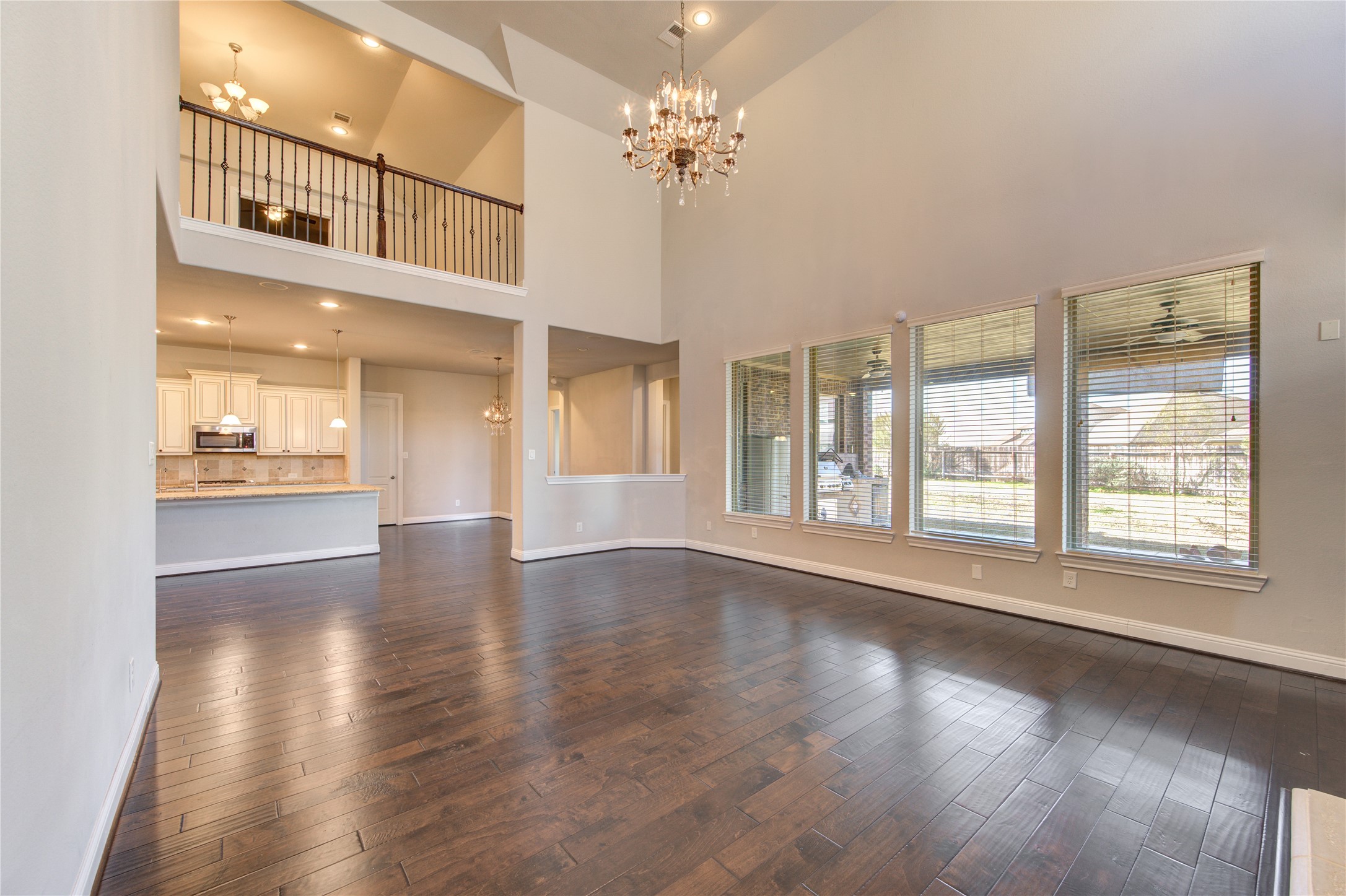 20411 Fawn Rest Place Spring, TX 77379 - Photo 20 of 50 a view of an empty room with wooden floor and a window