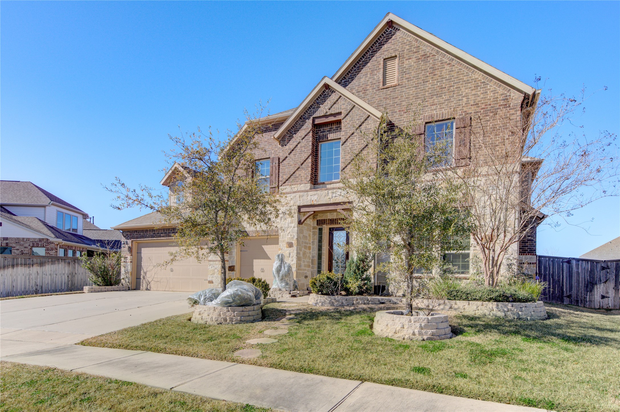 20411 Fawn Rest Place Spring, TX 77379 - Photo 2 of 50 a front view of a house with swimming pool