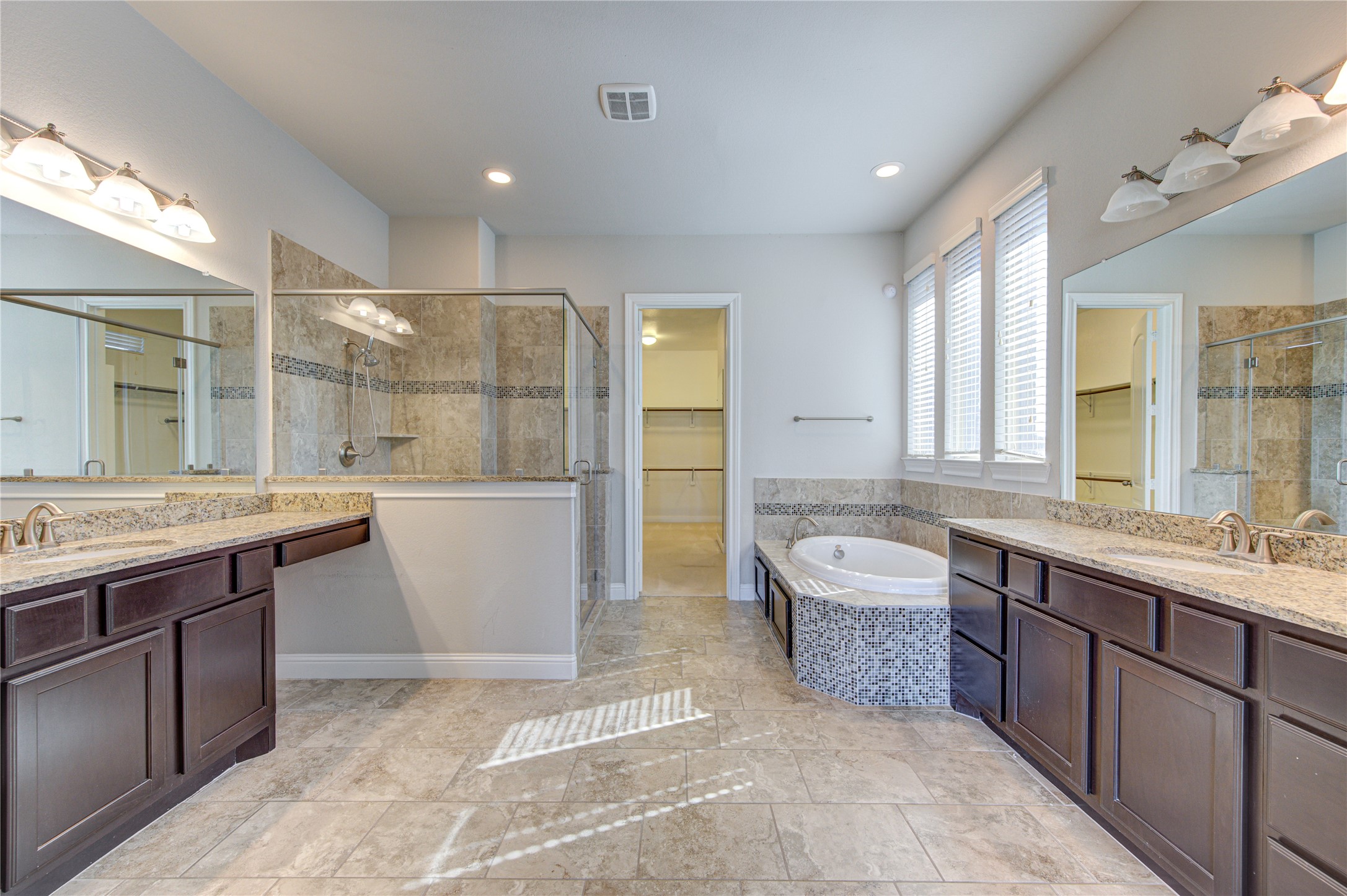 20411 Fawn Rest Place Spring, TX 77379 - Photo 30 of 50 a spacious bathroom with a tub sink and mirror