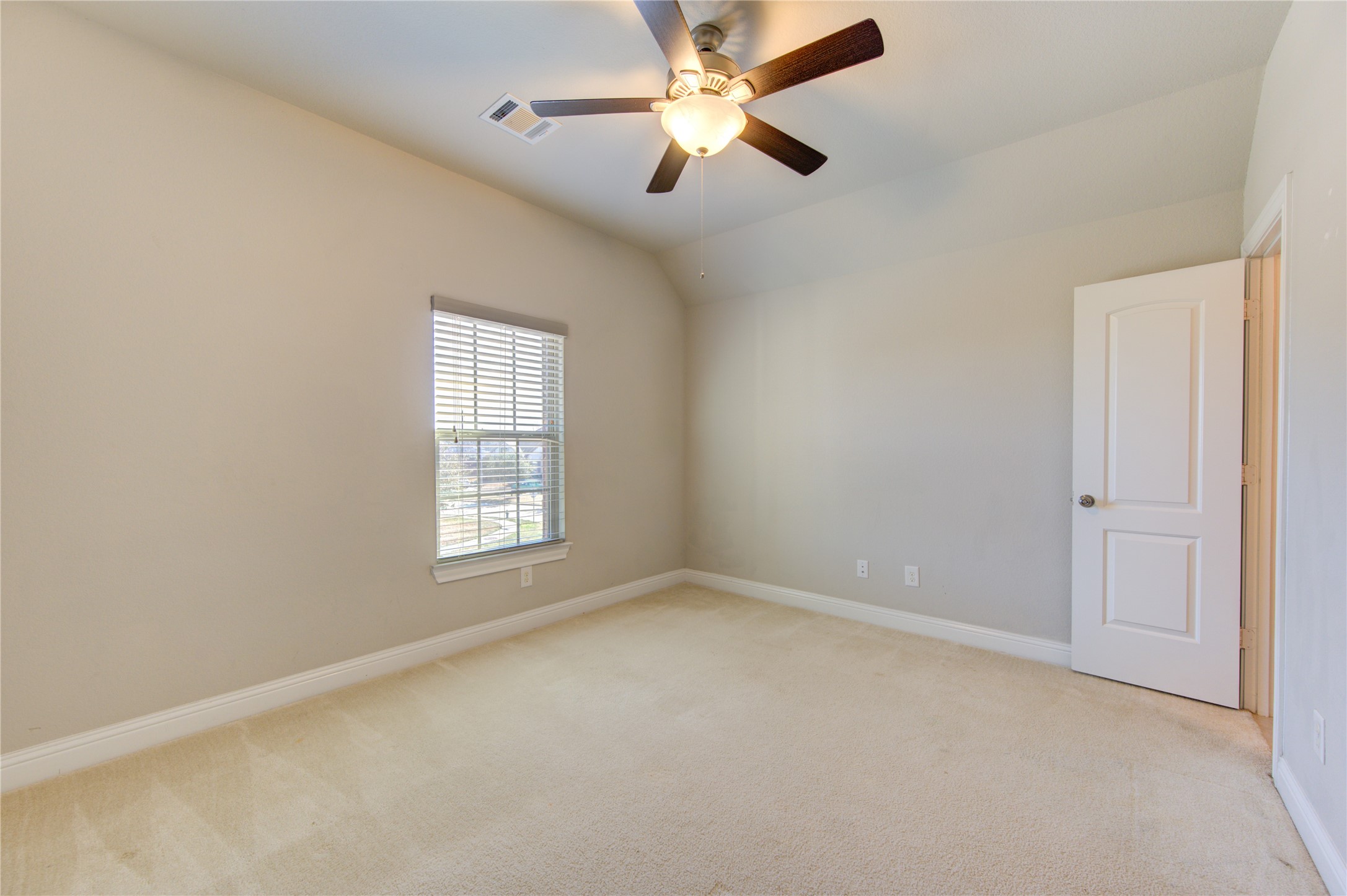 20411 Fawn Rest Place Spring, TX 77379 - Photo 44 of 50 wooden floor in an empty room with a window