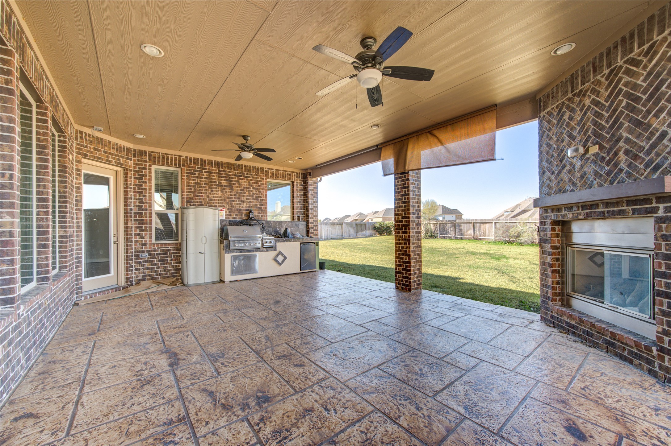 20411 Fawn Rest Place Spring, TX 77379 - Photo 48 of 50 a view of an empty room with a fireplace and a large window