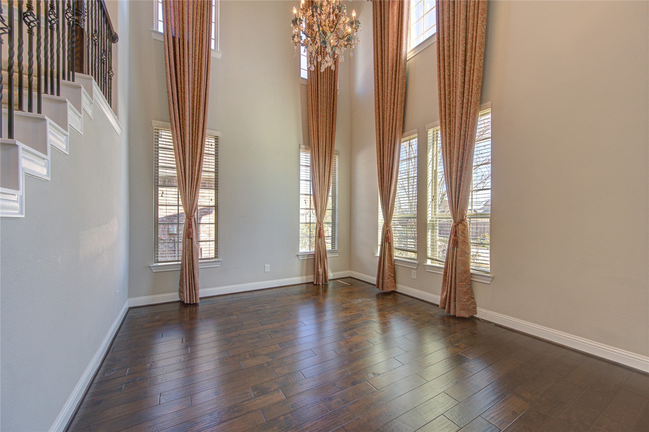 20411 Fawn Rest Place Spring, TX 77379 - Photo 6 of 50 an empty room with wooden floor and windows