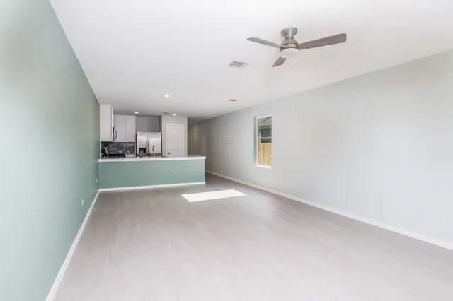 an empty room with windows