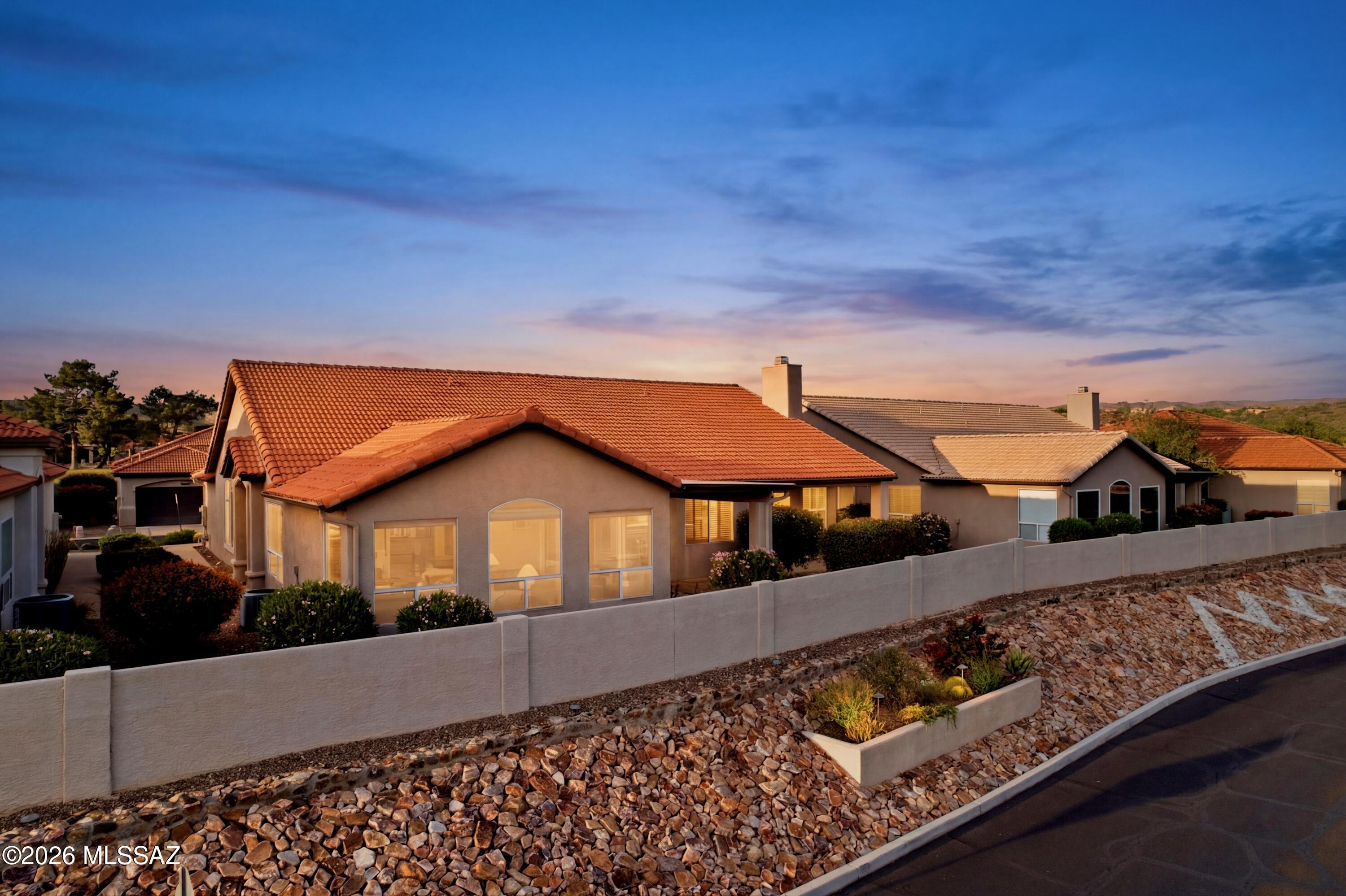 64351 East Wind Ridge Circle Tucson, AZ 85739 - Photo 37 of 41 a house view with a garden space