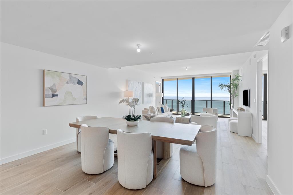 900 North Ocean Boulevard, Unit 1702 Pompano Beach, FL 33062 - Photo 10 of 49 a view of a dining room with furniture and window