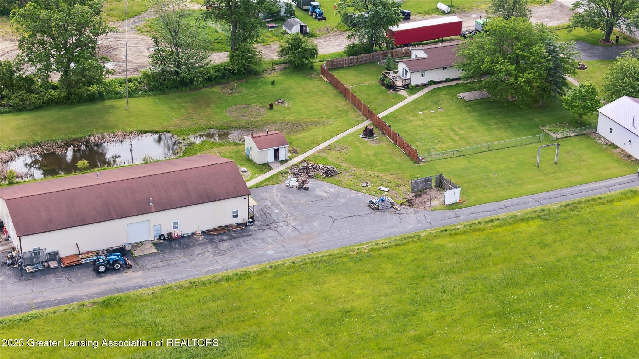 1234 Lamb Road Mason, MI 48854 - Photo 54 of 61 53-1234-Lamb-Rd-Mason-MI-48854-WindowSti