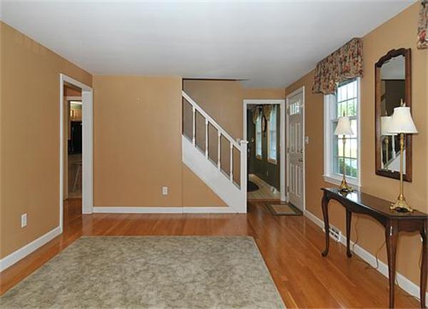 23 Whippletree Road Chelmsford, MA 01824 - Photo 12 of 28 a view of entryway with wooden floor and livingroom
