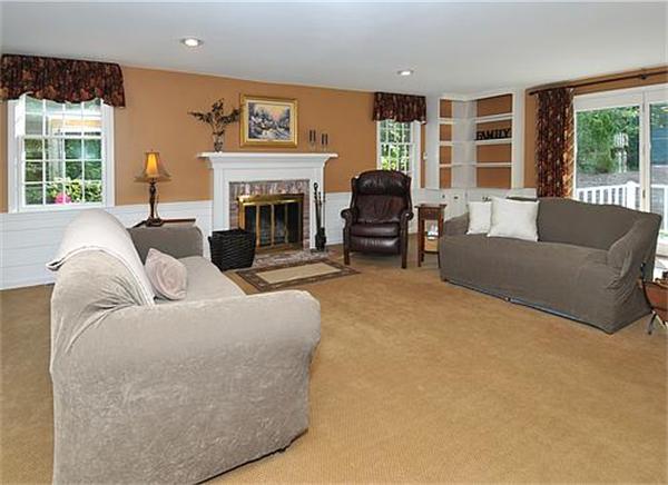 23 Whippletree Road Chelmsford, MA 01824 - Photo 13 of 28 a living room with furniture large window and fireplace