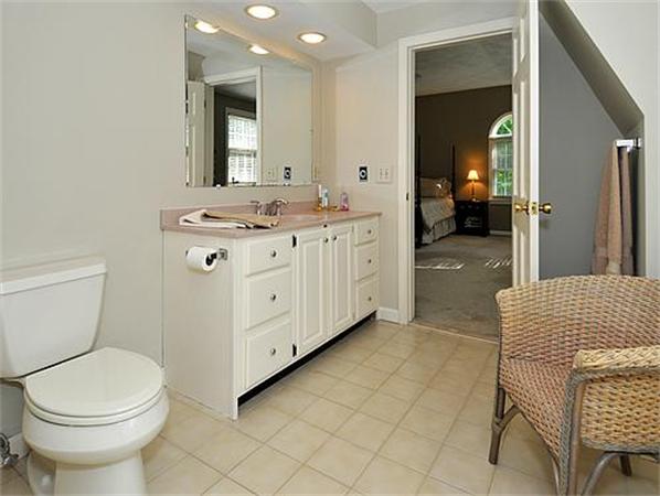 23 Whippletree Road Chelmsford, MA 01824 - Photo 20 of 28 a spacious bathroom with a sink a toilet and mirror