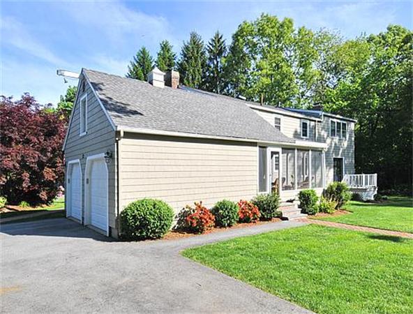 23 Whippletree Road Chelmsford, MA 01824 - Photo 26 of 28 a view of a house with a yard plants and large trees