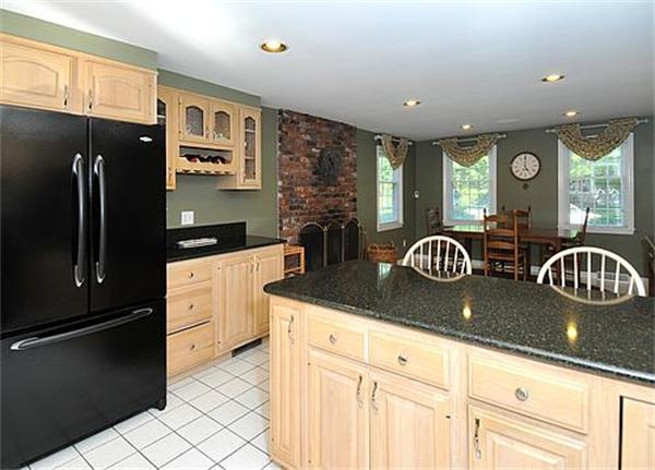 23 Whippletree Road Chelmsford, MA 01824 - Photo 8 of 28 a kitchen with counter top space cabinets and stainless steel appliances