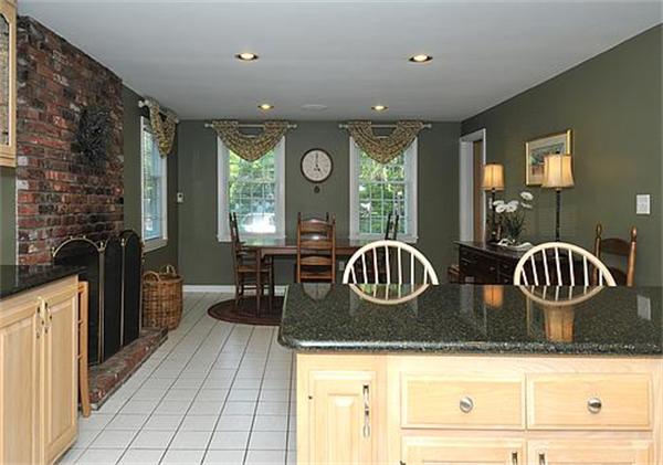 23 Whippletree Road Chelmsford, MA 01824 - Photo 9 of 28 a kitchen with a granite countertop sink a stove and cabinets