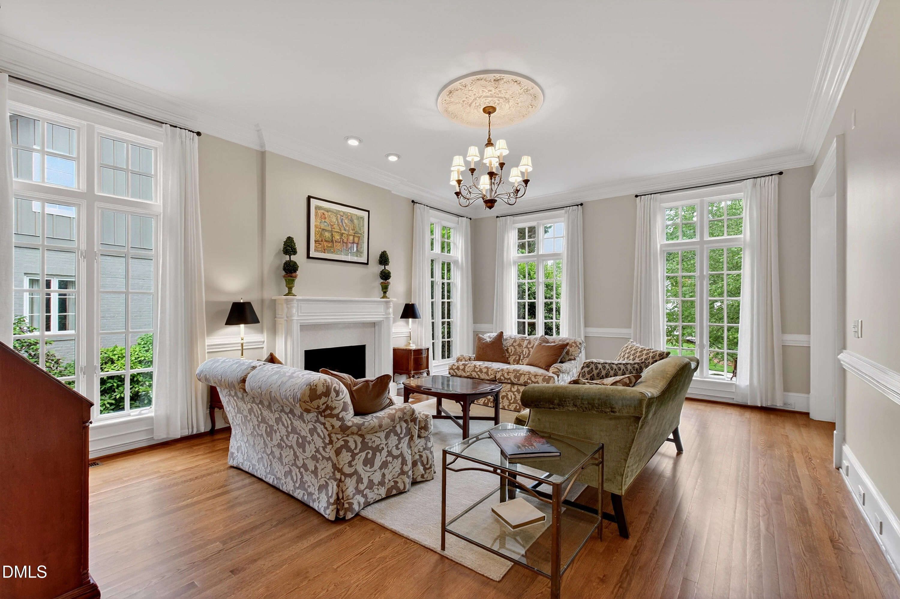 2536 Wake Drive Raleigh, NC 27608 - Photo 6 of 74 a living room with fireplace furniture and a wooden floor