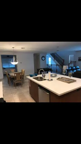 a bathroom with a sink a mirror and a toilet