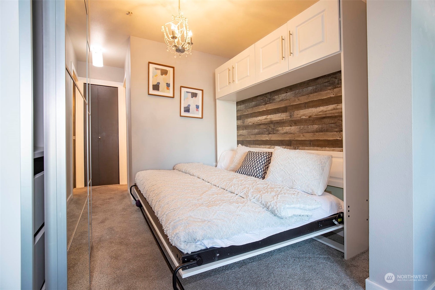 655 Crockett Street, Unit B304 Seattle, WA 98109 - Photo 11 of 35 a bedroom with a bed and window