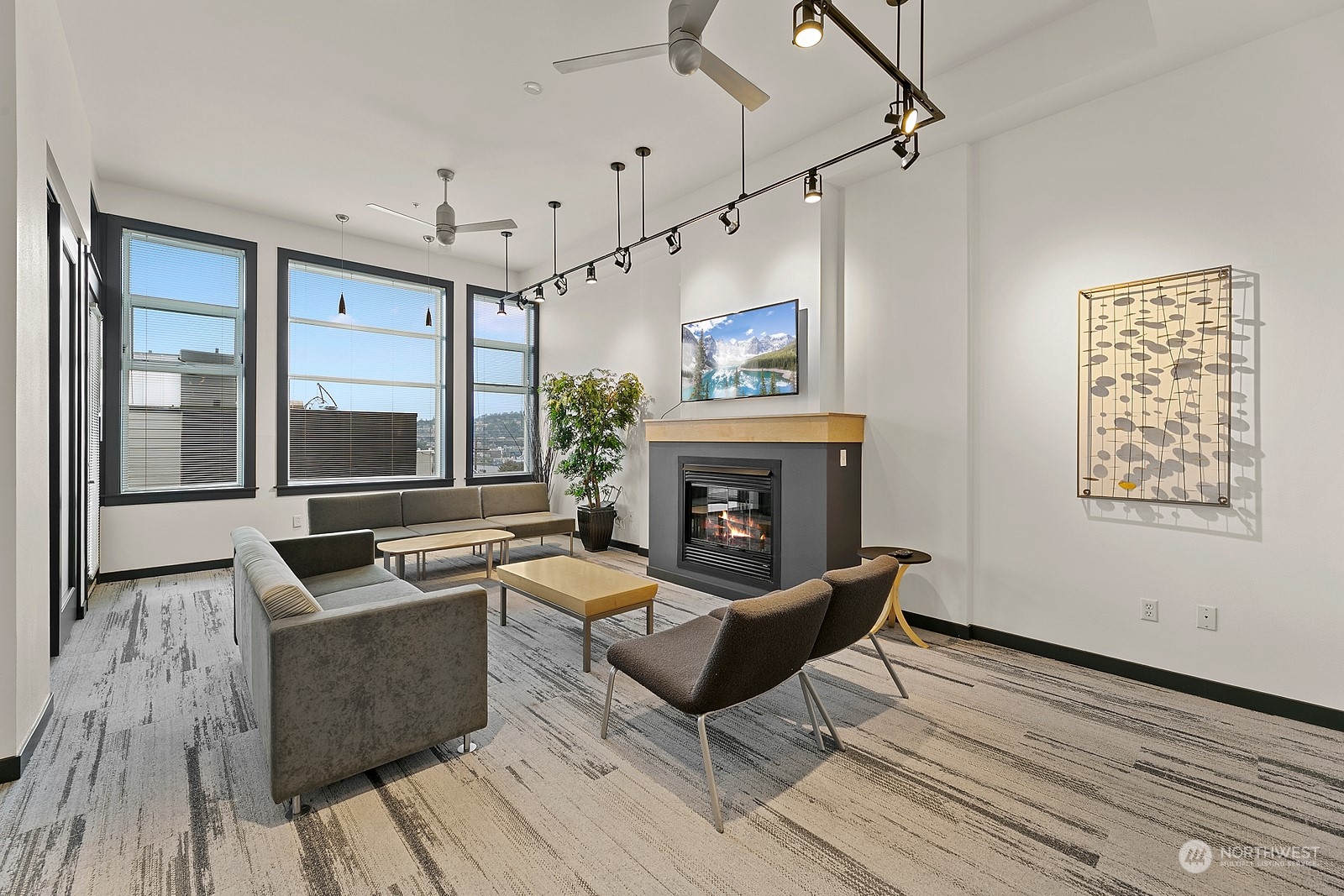 655 Crockett Street, Unit B304 Seattle, WA 98109 - Photo 32 of 35 a living room with furniture and a fireplace