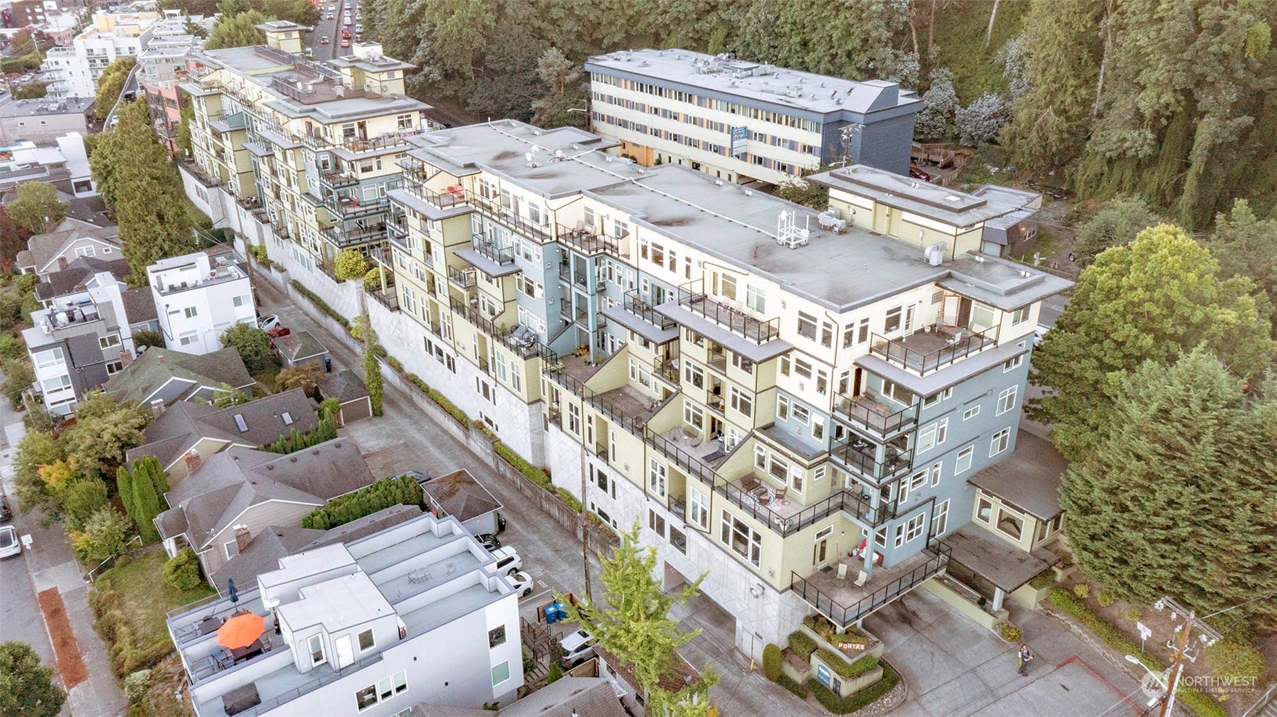655 Crockett Street, Unit B304 Seattle, WA 98109 - Photo 35 of 35 an aerial view of a multi story residential apartment building with yard