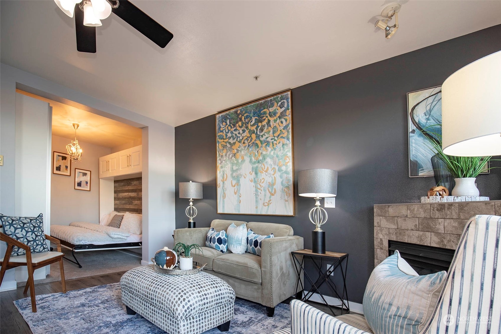 655 Crockett Street, Unit B304 Seattle, WA 98109 - Photo 6 of 35 a living room with furniture and a fireplace