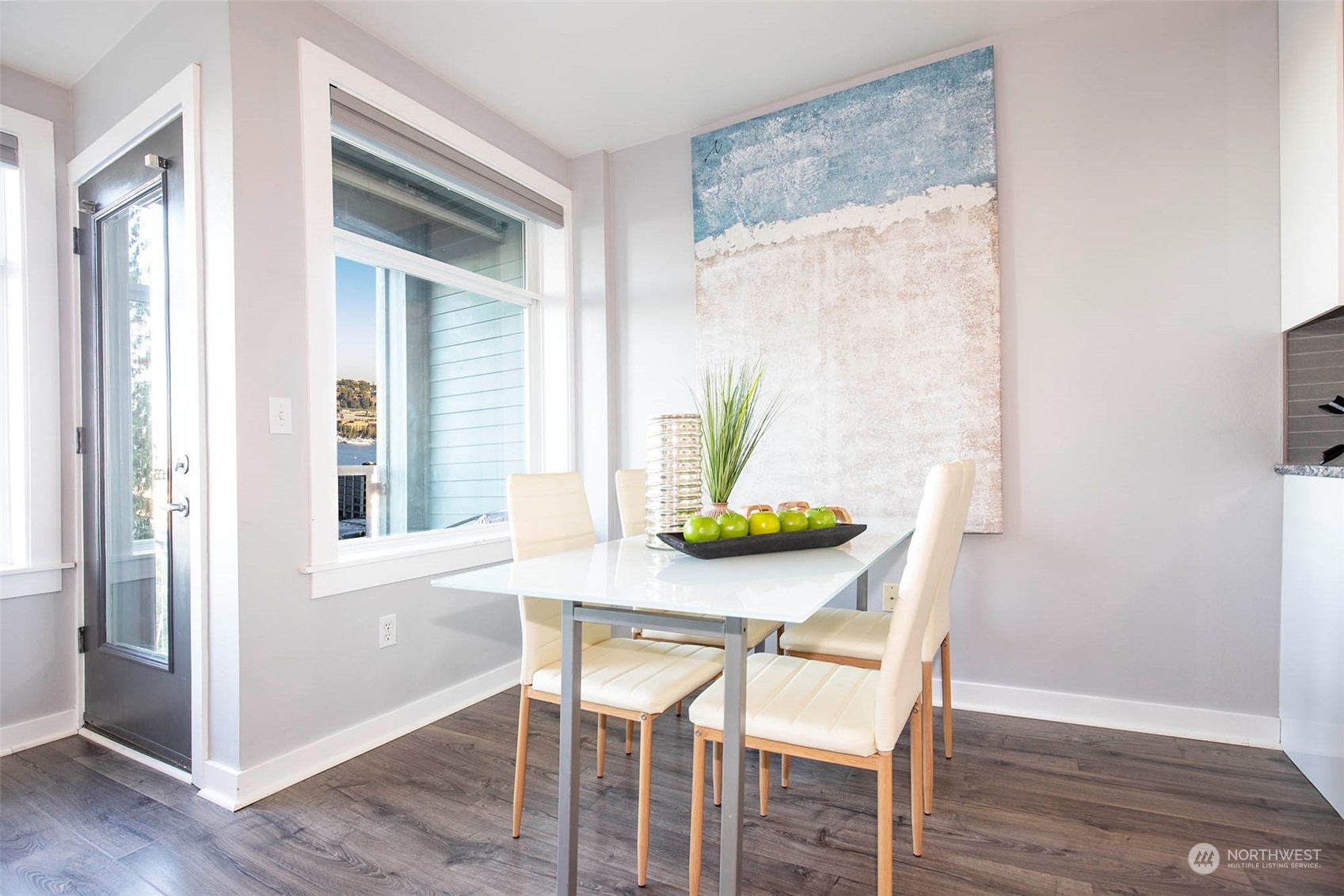 655 Crockett Street, Unit B304 Seattle, WA 98109 - Photo 7 of 35 a dining room with furniture and window