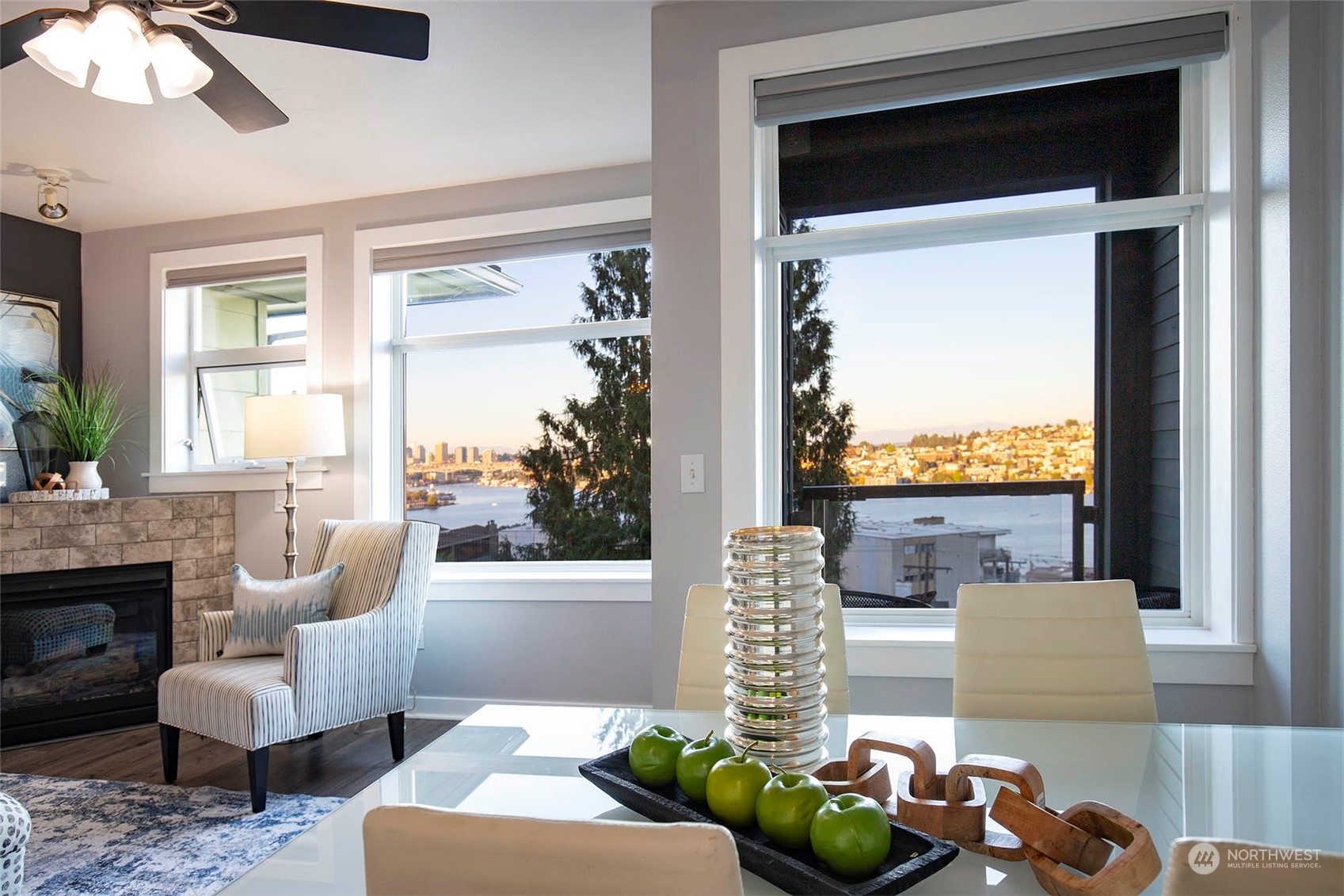 655 Crockett Street, Unit B304 Seattle, WA 98109 - Photo 8 of 35 a living room with furniture fireplace and a large window