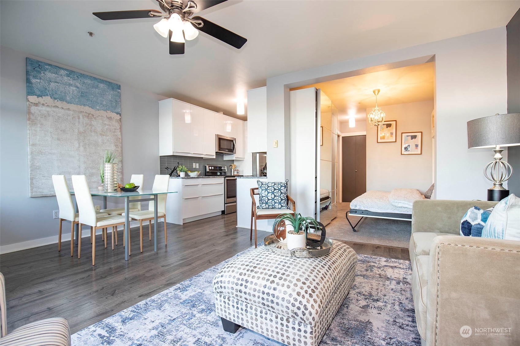 655 Crockett Street, Unit B304 Seattle, WA 98109 - Photo 9 of 35 a living room with furniture and a large window