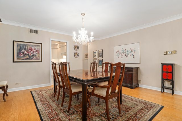 1 North Dee Road, Unit 2D Park Ridge, IL 60068 - Photo 13 of 38 a view of a dining room with furniture