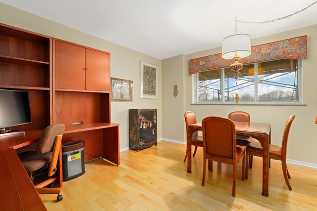 1 North Dee Road, Unit 2D Park Ridge, IL 60068 - Photo 21 of 38 a dining room with furniture and window