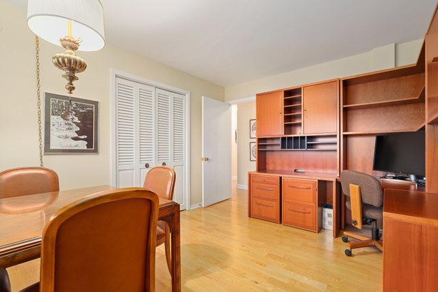 1 North Dee Road, Unit 2D Park Ridge, IL 60068 - Photo 22 of 38 a bedroom with furniture and a window