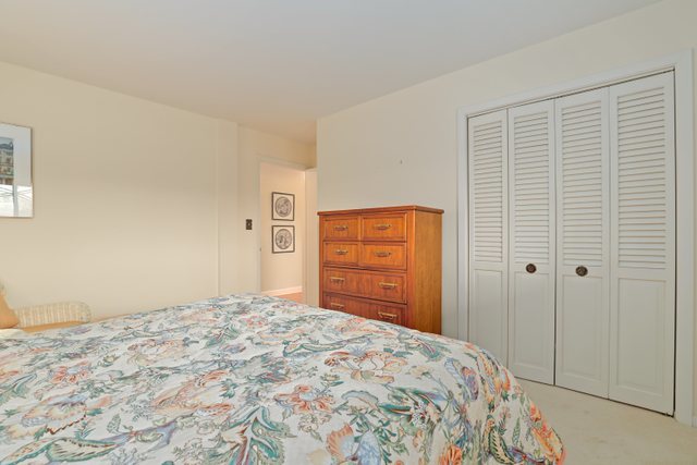 1 North Dee Road, Unit 2D Park Ridge, IL 60068 - Photo 24 of 38 a bedroom with a bed and a closet