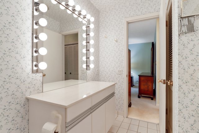 1 North Dee Road, Unit 2D Park Ridge, IL 60068 - Photo 27 of 38 a bathroom with a sink a toilet and shower