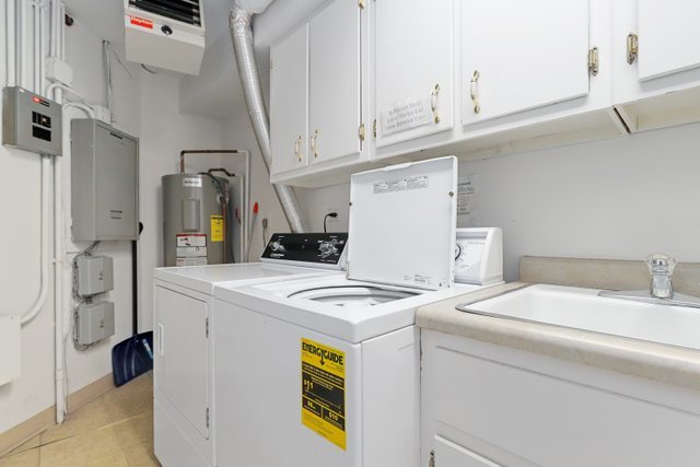 1 North Dee Road, Unit 2D Park Ridge, IL 60068 - Photo 33 of 38 a utility room with dryer and washer
