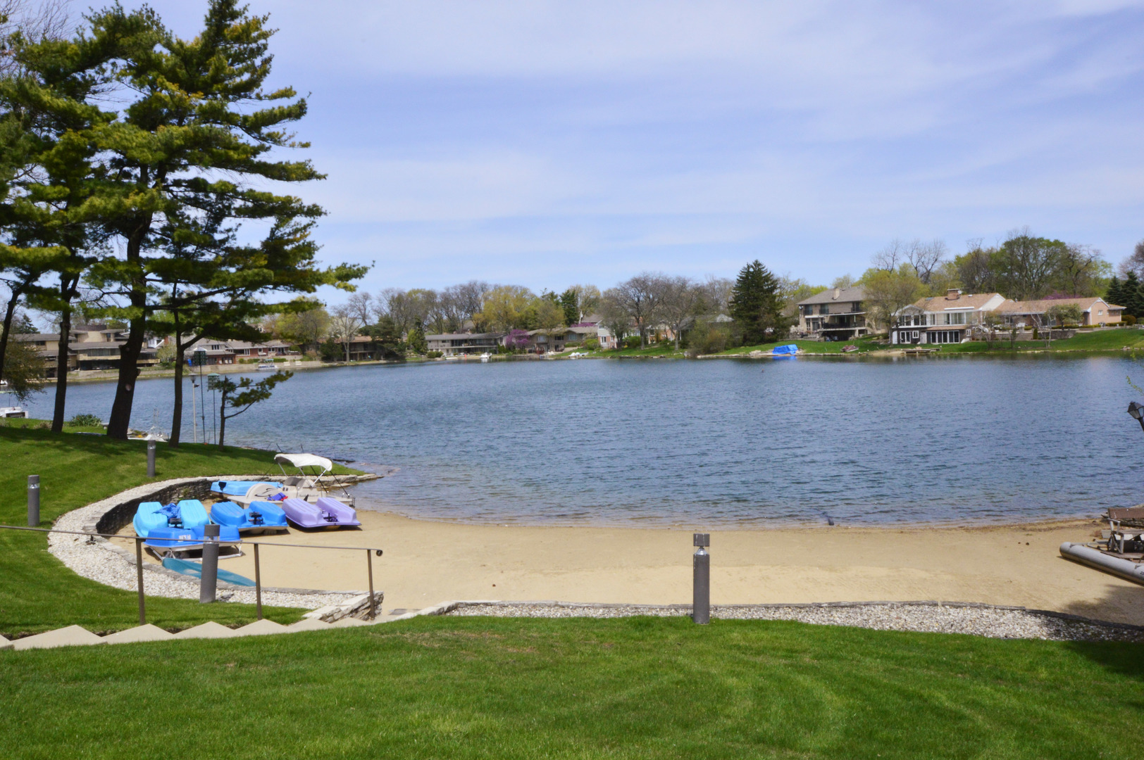 1 North Dee Road, Unit 2D Park Ridge, IL 60068 - Photo 37 of 38 a view of a lake with houses in the back
