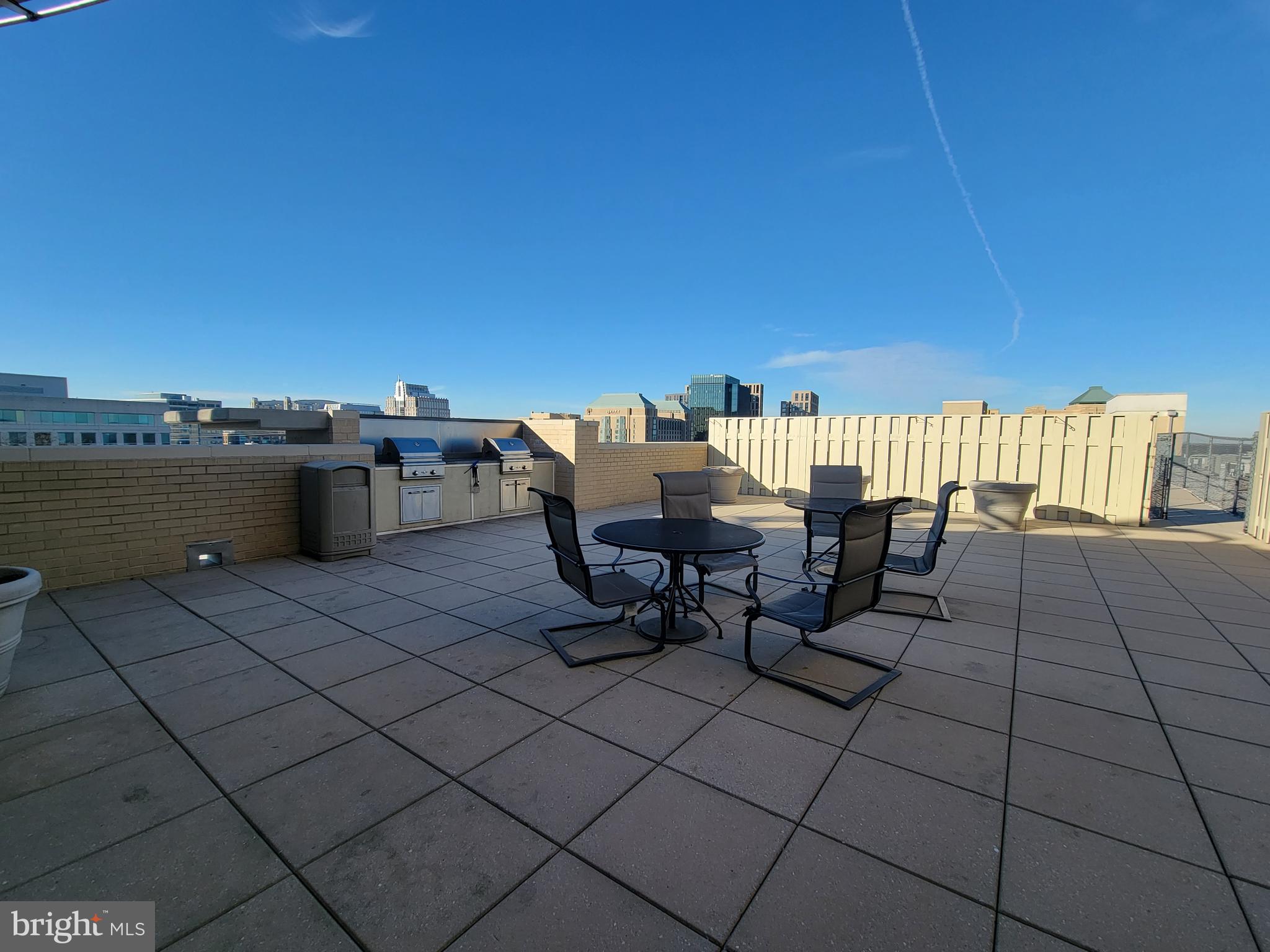 11800 Sunset Hills Road, Unit 1103 Reston, VA 20190 - Photo 32 of 46 14th Floor grill area and outdoor dining