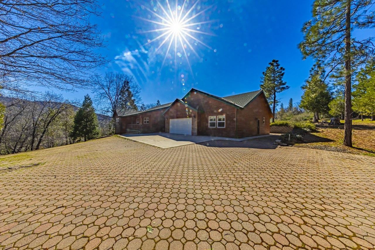 53312 Timberview Road North Fork, CA 93643 - Photo 3 of 84 a view of a backyard of the house