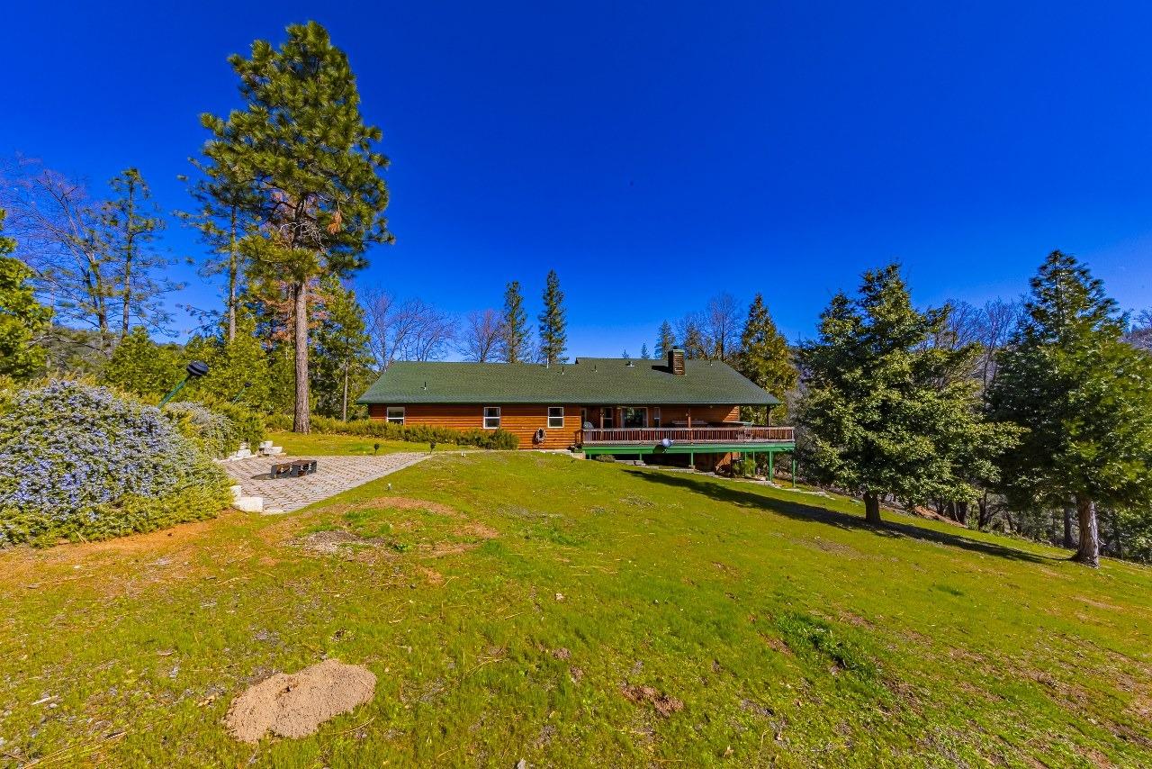 53312 Timberview Road North Fork, CA 93643 - Photo 46 of 84 a view of a swimming pool with an outdoor space and seating area