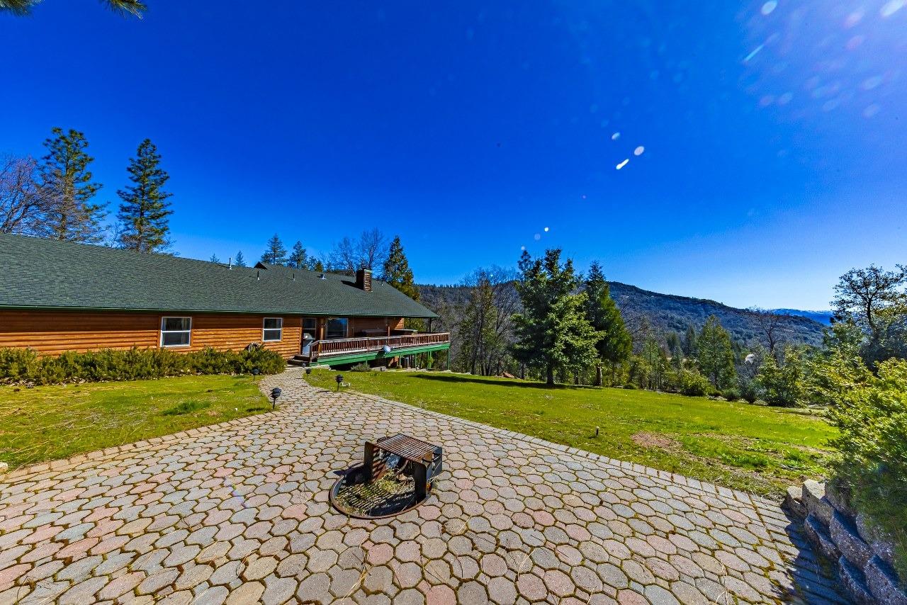 53312 Timberview Road North Fork, CA 93643 - Photo 49 of 84 a view of a backyard with a garden and plants