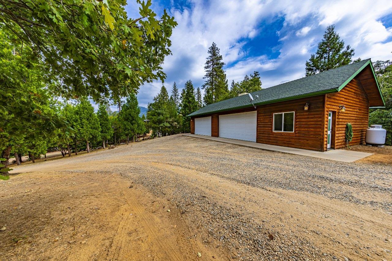 53312 Timberview Road North Fork, CA 93643 - Photo 63 of 84 a view of a house with a backyard