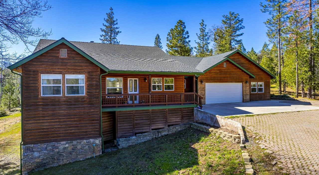53312 Timberview Road North Fork, CA 93643 - Photo 77 of 84 a front view of a house with a yard