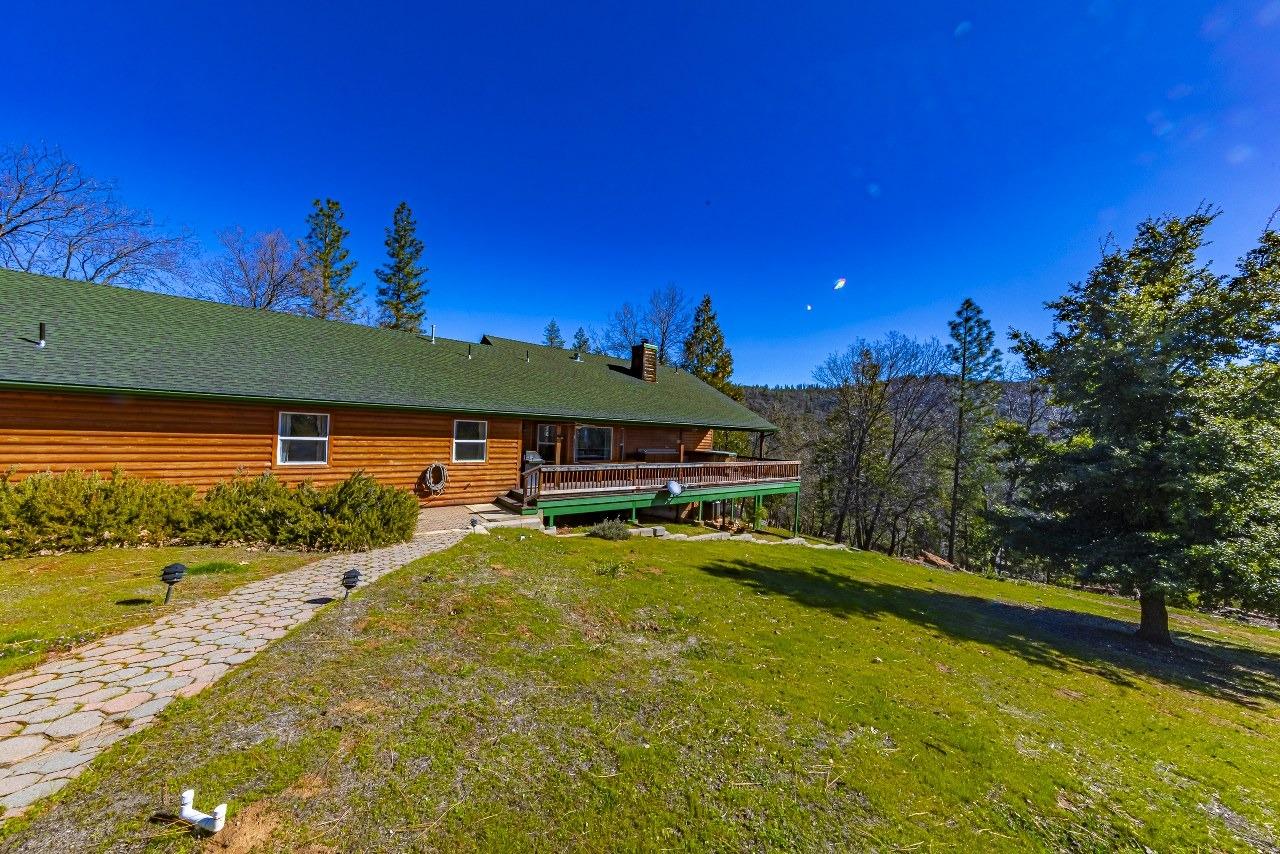 53312 Timberview Road North Fork, CA 93643 - Photo 81 of 84 a view of a swimming pool with an outdoor space and seating area
